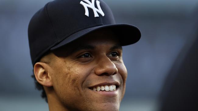 NEW YORK, NEW YORK - JUNE 09: Juan Soto #22 of the New York Yankees looks on in the dugout against the Los Angeles Dodgers during the third inning  at Yankee Stadium on June 09, 2024 in the Bronx borough of New York City. (Photo by Luke Hales/Getty Images)