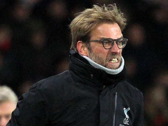Liverpool's German manager Jurgen Klopp gestures on the touchline during the English Premier League football match between Sunderland and Liverpool at the Stadium of Light in Sunderland, north-east England on January 2, 2017. / AFP PHOTO / Lindsey PARNABY / RESTRICTED TO EDITORIAL USE. No use with unauthorized audio, video, data, fixture lists, club/league logos or 'live' services. Online in-match use limited to 75 images, no video emulation. No use in betting, games or single club/league/player publications. /
