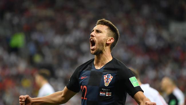 MOSCOW, RUSSIA - JULY 11:  Josip Pivaric of Croatia celebrates after teammate Mario Mandzukic scores their team's second goal during the 2018 FIFA World Cup Russia Semi Final match between England and Croatia at Luzhniki Stadium on July 11, 2018 in Moscow, Russia.  (Photo by Dan Mullan/Getty Images)