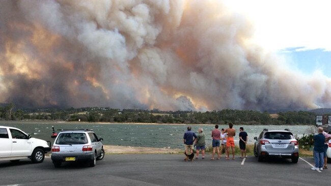 Residents watch the fire. Picture: Facebook