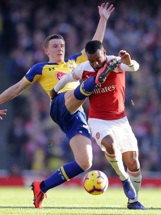 Alexandre Lacazette of Arsenal is challenged by Matt Targett of Southampton. Picture: Getty Images
