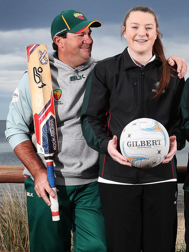 Former Tasmanian cricketer Dan Marsh with daughter Ella Marsh 15, who has represented her state in a both netball and cricket Picture: NIKKI DAVIS-JONES