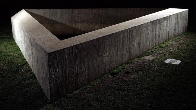 The untitled concrete triangle by sculptor Donald Judd.