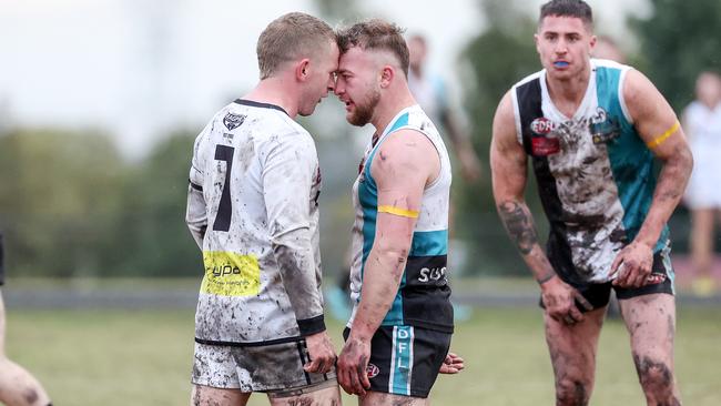 EDFL: Harley Short of Roxburgh Park and Hillside’s Lucas Failli get to know each other. Picture: George Sal