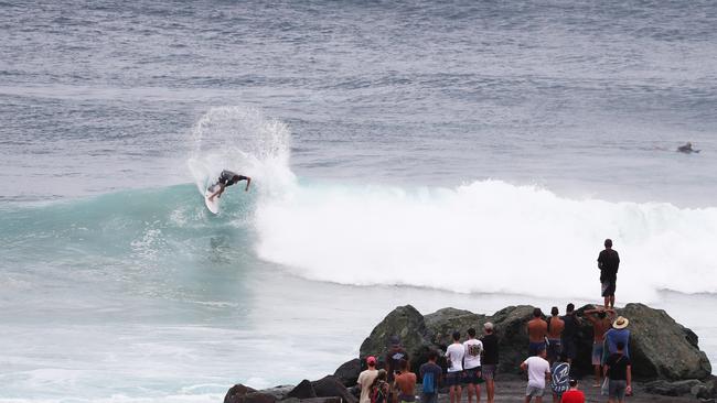 Surfers at Snapper Rocks and Kirra riding the Large swell produced by Cyclone OMA. Photograph : Jason O'Brien
