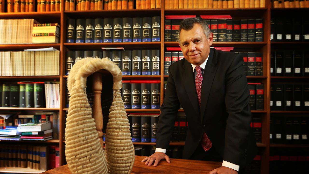 Tony McAvoy SC in his Sydney office with a ceremonial wig similar to the one he wore this morning when he became Australia's first Aboriginal silk