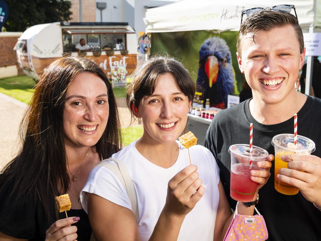 Sampling some of Melek's Baklava and More produce are (from left) Georgia Smith, Maddi Cross and Ben Brunner at Locals 4 Locals summer edition on the lawn of Empire Theatres, Friday, February 18, 2022. Picture: Kevin Farmer