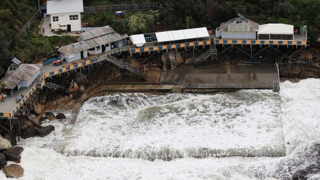 Flood damage from the air as a result of the low pressure system that hammered Sydney and the East Coast over the weekend. Wylies Baths at Coogee looking like a washing machine. Picture: Toby Zerna