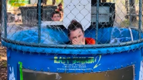 Going … Chief Minister Lia Finocchiaro hits the water at the Freds Pass Rural Show