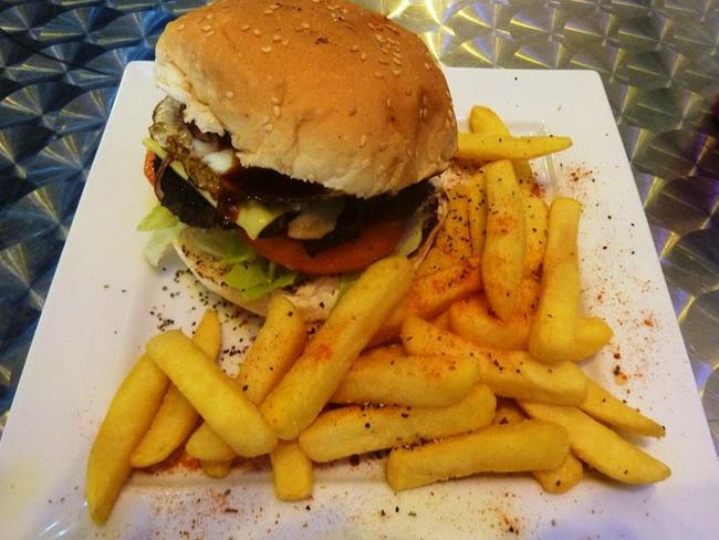 Aussie camel burger with a side of chips Picture: Instagram/barbbatof1988