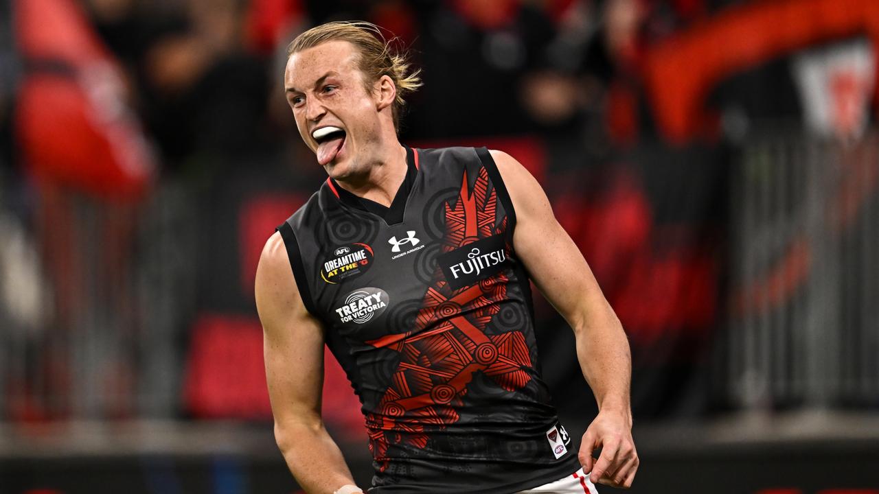 PERTH, AUSTRALIA - MAY 27: Mason Redman of the Bombers celebrates a goal during the 2023 AFL Round 11 match between the West Coast Eagles and the Essendon Bombers at Optus Stadium on May 27, 2023 in Perth, Australia. (Photo by Daniel Carson/AFL Photos via Getty Images)