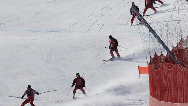 Course slippers ski down as they help to prepare the piste ahead of the downhill portion of the men's combined in Jeongseon. Picture: AP