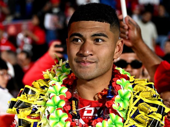 AUCKLAND, NEW ZEALAND - NOVEMBER 02: Isaiya Katoa of Tonga celebrates with fans after winning the men's 2024 Rugby League Pacific Championship match between New Zealand Kiwis and Tonga XIII at Go Media Stadium on November 02, 2024 in Auckland, New Zealand. (Photo by Hannah Peters/Getty Images)