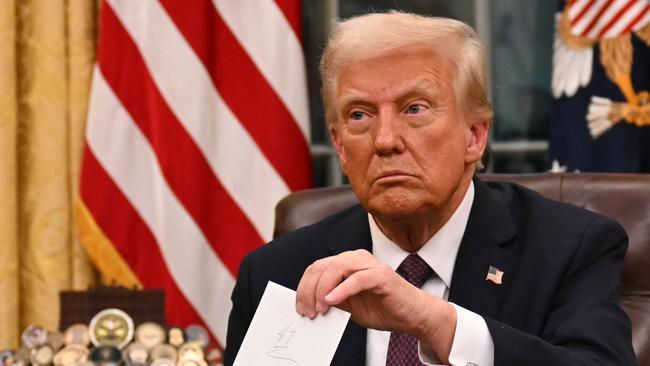 Withdrawing the US from the accords was among the first executive orders President Donald Trump signed after getting sworn in this week. Picture: Jim Watson / POOL / AFP