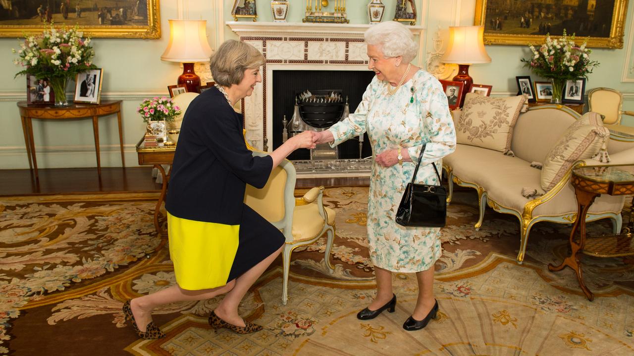 Theresa May bows as she meets the Queen on becoming her new Prime Minister in 2016 (Photo by Dominic Lipinski - WPA Pool/Getty Images)