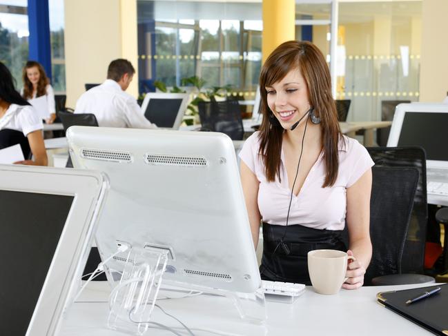 Thinkstock image - group of five business people working in an open office or call centre