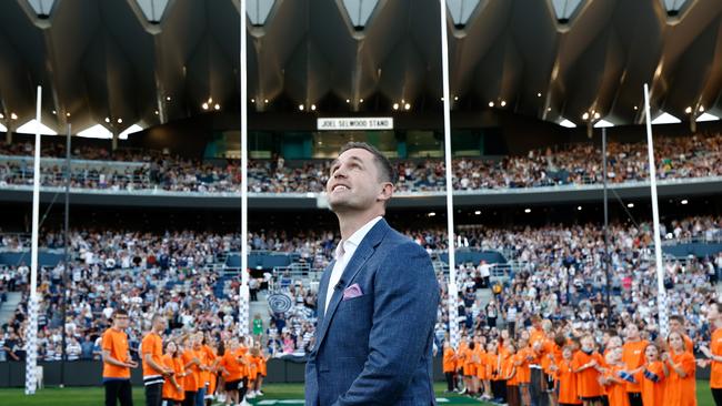 Geelong champion Joel Selwood stands proudly in front of the grandstand named in his honour. Picture: Michael Willson/AFL Photos via Getty Images.