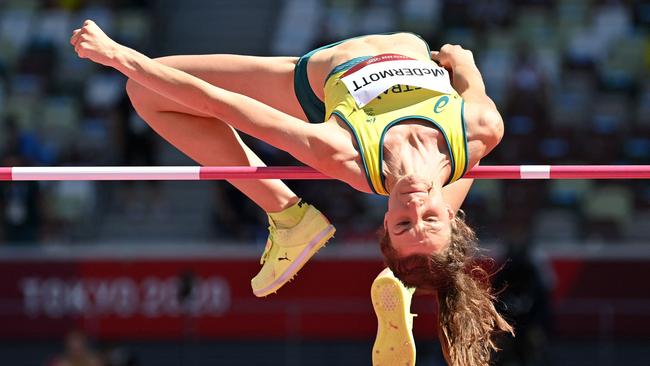 Australia’s Nicola McDermott clears the bar during the women's high jump qualification round in Tokyo. Picture: AFP