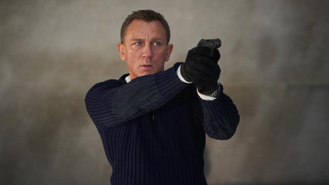 James Bond (Daniel Craig) prepares to shoot in No Time to Die. Picture: Supplied