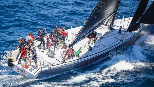 The tricky jump from the back of a speeding 66-foot racing machine was handled with aplomb by Bishop. Picture: Salty Dingo