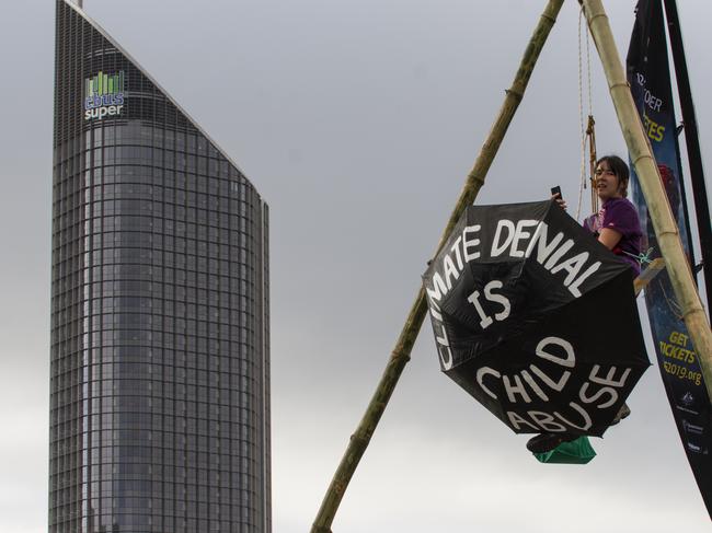 Extinction Rebellion protester Sophie Thompson blocking traffic on the Victoria Bridge this week.