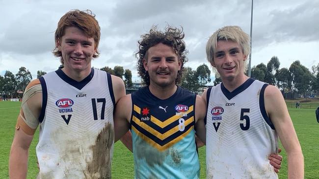 Charlie Hillier (middle) alongside fellow Pioneers Malik Gordon (left) and Oliver Poole (right) after a trial match between Vic Country and The Allies