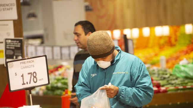 Victorians have started wearing masks when out and about. Picture: Rob Leeson