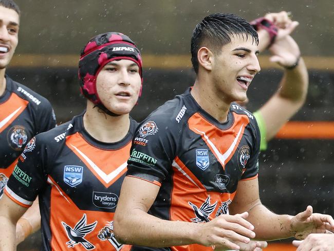 SUNDAY TELEGRAPH. FEBRUARY 26, 2022. Pictured is Tigers fullback Cameron Kanaan after scoring a try during the Balmain Tigers v Newcastle Knights NSWRL Junior Rep Harold Matts Game at Leichhardt Oval today. Picture: Tim Hunter.