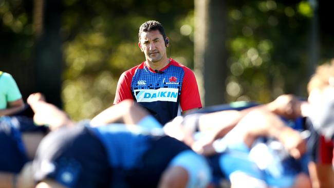 Daryl Gibson watches his forwards scrummage during a Waratahs training session at Bus Loop Oval.