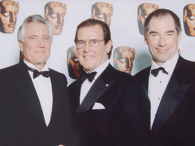 Lazenby with former James Bond stars Roger Moore and Timothy Dalton.