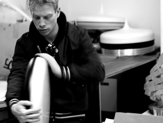 Viktor Legin works on a droplet pendant light.