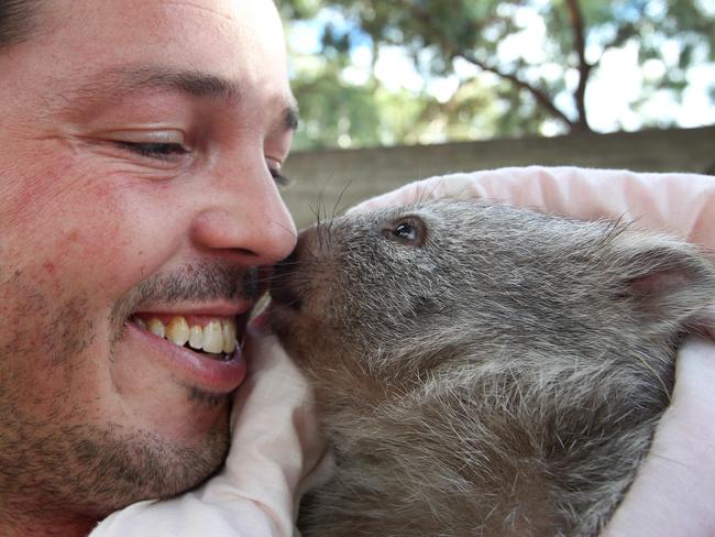 Bonorong Wildlife Sanctuary Director, Greg Irons and 8 month old Maria, who was rescued on Maria Island after her mother died. She will be released into the wild on Maria Island when she is 2 years old and weighs about 20kg.