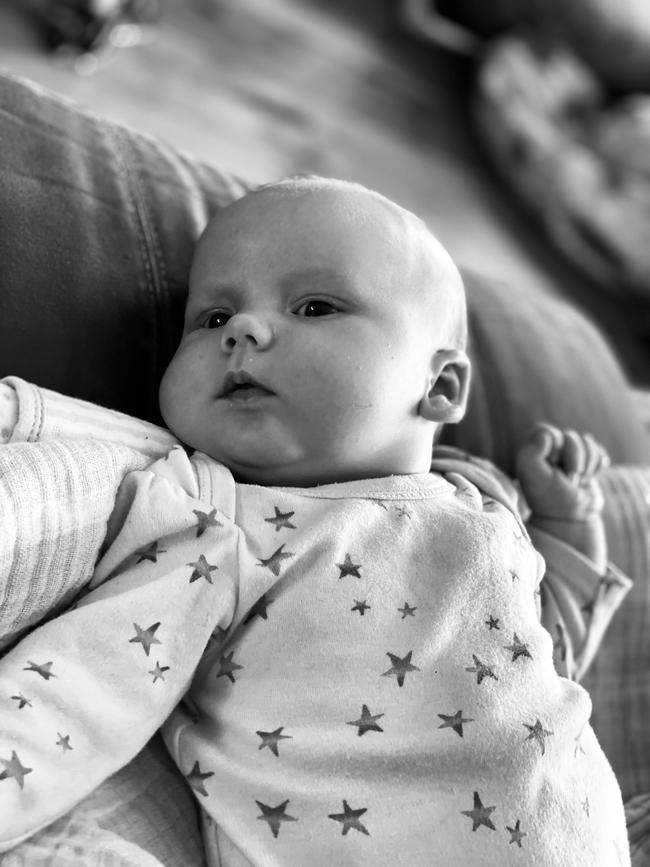 Matilda Lily Mary Beehag cilling out on the couch at one month old. Picture: Julie Buckle