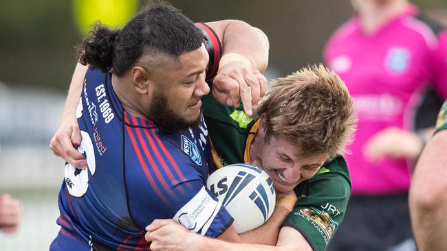 Macarthur Rugby League Reserve Grade, Joseph Faalavaau of Campbelltown Collegians met by David Ecclestone of the Lions, Mittagong 18 defeated Campbelltown 10. Pics by Julian Andrews.