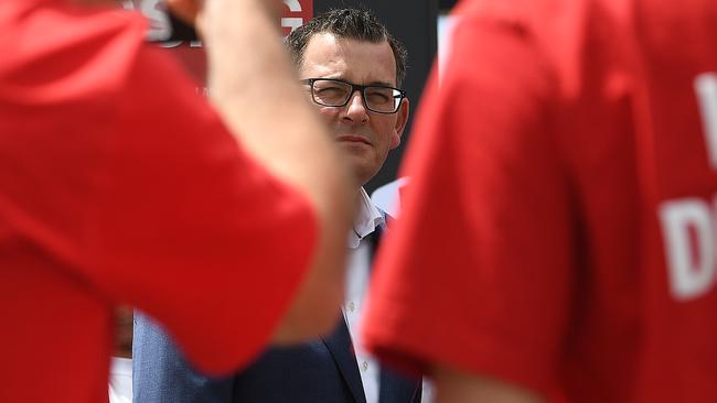 Victorian Premier Daniel Andrews is seen alongside Labor supporters wearing red shirts ahead of last year’s state election. Picture: AAP Image/Julian Smith