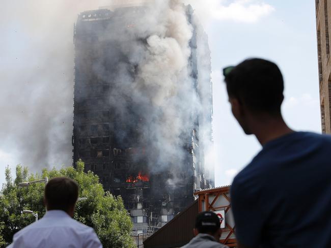 Shaken survivors have told of seeing people trapped in burning units or leaping from windows to escape the flames as they raced towards the building upper floors. Picture: Adrian Dennis/AFP