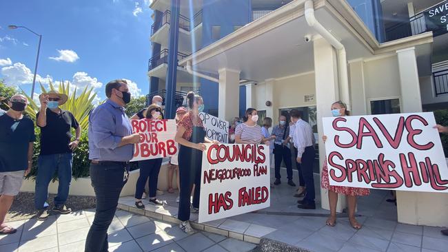 Cr Jared Cassidy (third from left) and residents oppose to plans for the two towers.