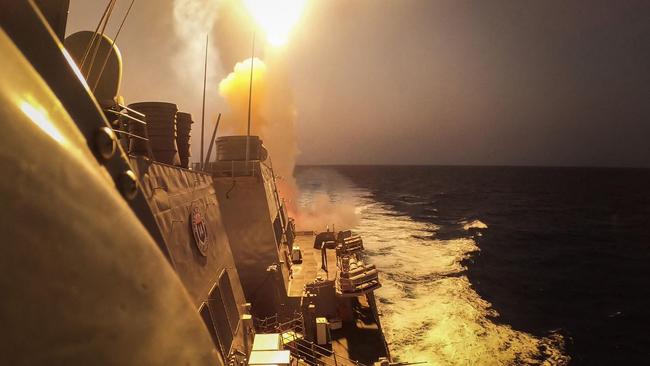 USS Carney (DDG 64) defeating a combination of Houthi missiles and unmanned aerial vehicles in the Red Sea on October 19. Picture: AFP