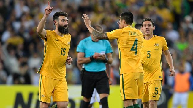 Mile Jedinak celebrates after scoring a goal for the Socceroos. Picture: Getty Images