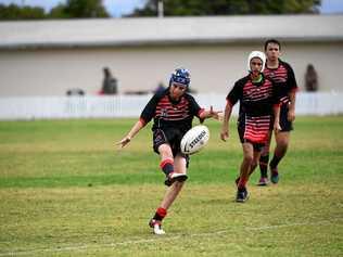 Bundaberg's Dawson Hess kicks the ball away while playing for the Wide Bay Bulls in under-13 at the 47th Battalion. Picture: Brian Cassidy