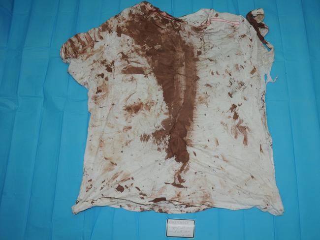 A shirt worn by a senior Rebels bikie, bashed by his own crew at Prospect in 2013. The attack was interrupted by police, effectively saving the man’s life