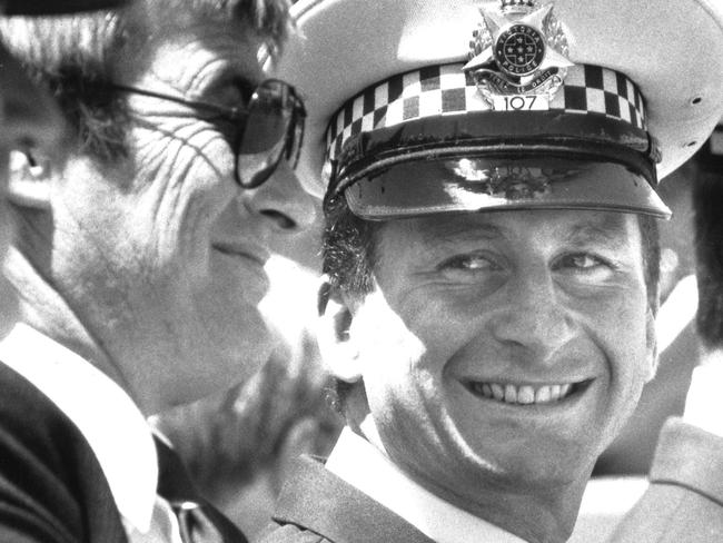 Det-Sgt Mark Wylie, right, with Det-Sgt Quinsee during the presentation of awards for bravery during the 1986 shootout.