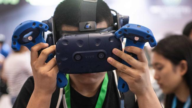 Virtual reality goggles could open up all new ways to view games. Picture: Fred Dufour / AFP