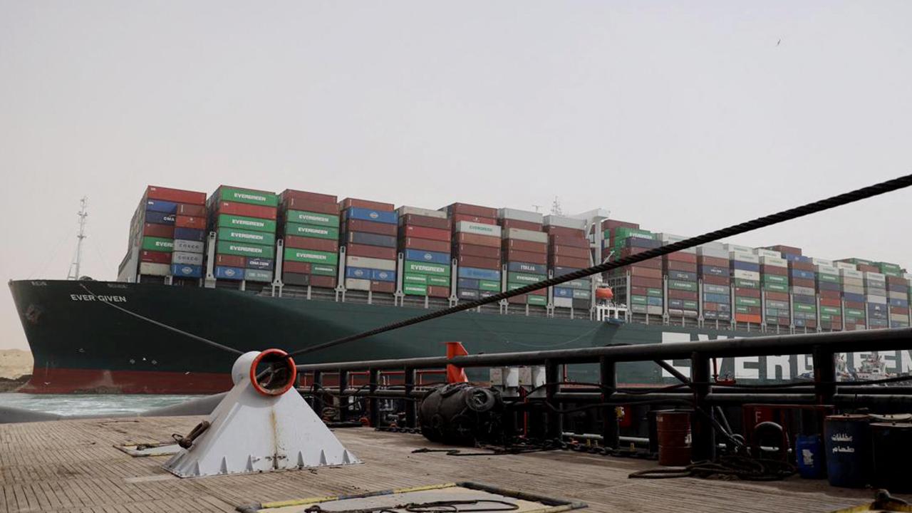 Egyptian tug boat equipped with a rope trying to free the vessel. Picture: Suez Canal Authority/AFP