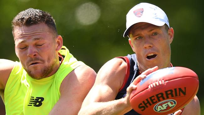 Jake Melksham marks infront of Steven May. Photo by Quinn Rooney/Getty Images via AFL Photos