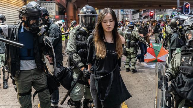 A pro-democracy protester is arrested by police during a clash in Hong Kong. Picture: Getty