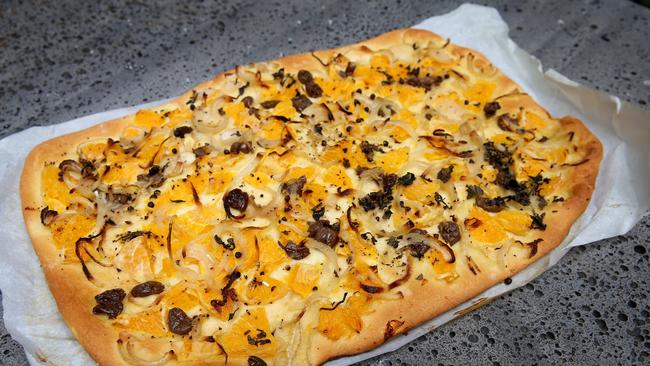 Picnic pleaser: Focaccia with orange and olives is an irresistable snack or entree. Picture: Andy Rogers