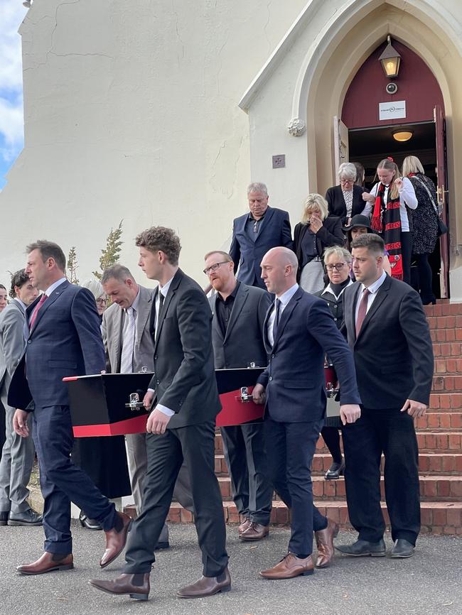 Pallbearers carry the coffin of Dallas Keogh-Frankling from St Mary's Catholic Church in Castlemaine. Picture: Julieanne Strachan