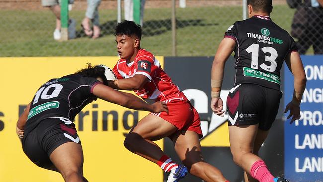 Palm beach Currumbin SHS’s Keno Kini takes on Marsden’s Xavier Stowers, left, and Chris Faagutu - all three are mentioned in our magic moments story. Picture: Liam Kidston.