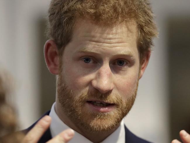 LONDON, UNITED KINGDOM - JUNE 15: Britain's Prince Harry speaks to people during his visit to Chatham House, the Royal Institute of International Affairs on June 15, 2017 in London, England..  Prince Harry visited Thursday to open their new extension, The Stavros Niarchos Foundation Floor, which will provide a permanent home for the Queen Elizabeth II Academy for Leadership in International Affairs, along with new meeting and work spaces. (Photo by Matt Dunham - WPA Pool/Getty Images)